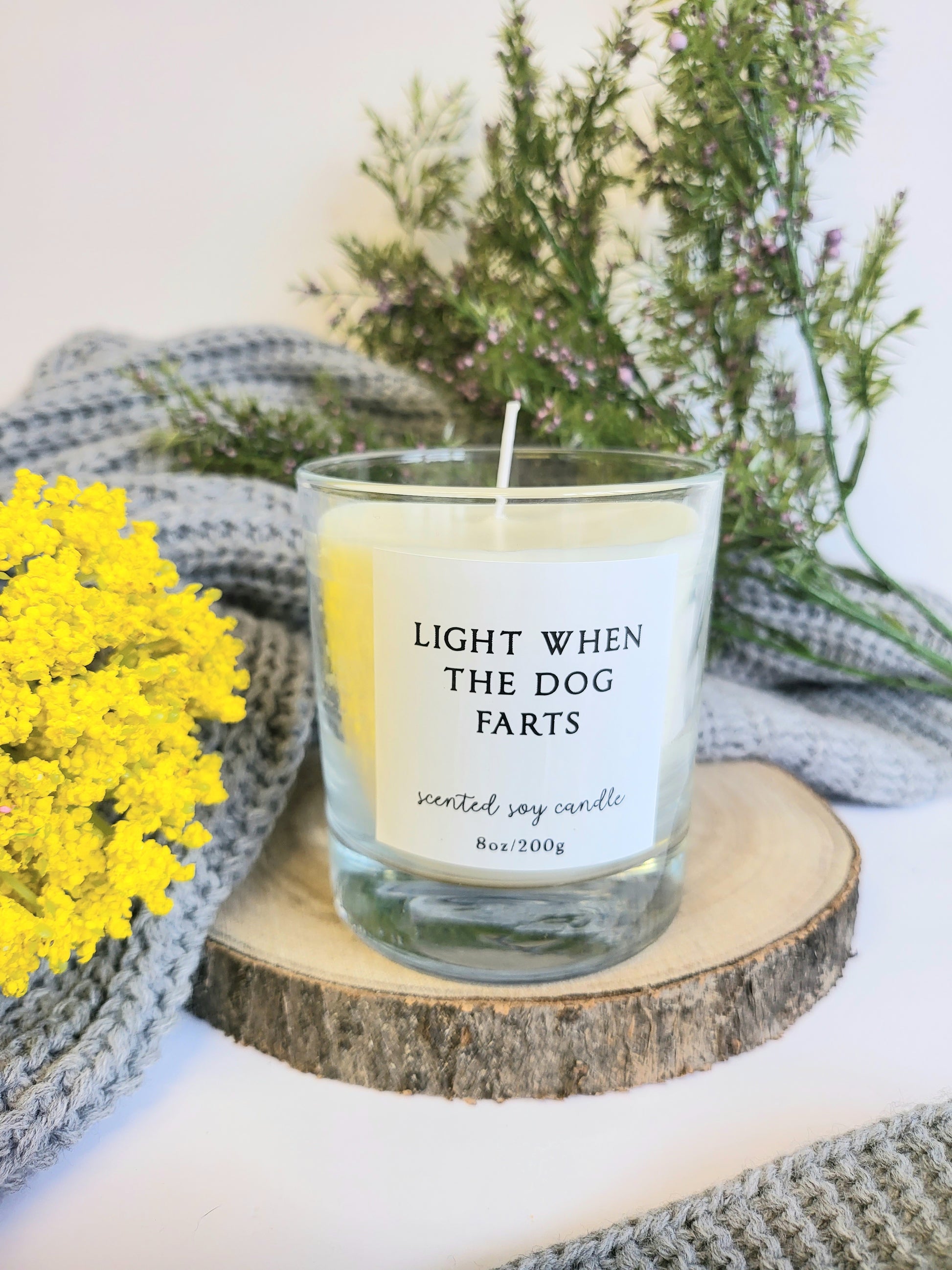 Light when dog farts candle.