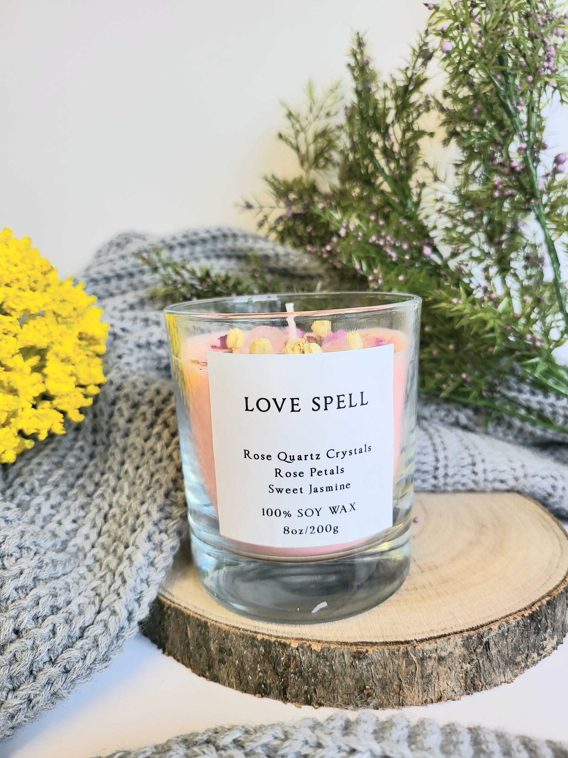 Rose quartz love spell candle.