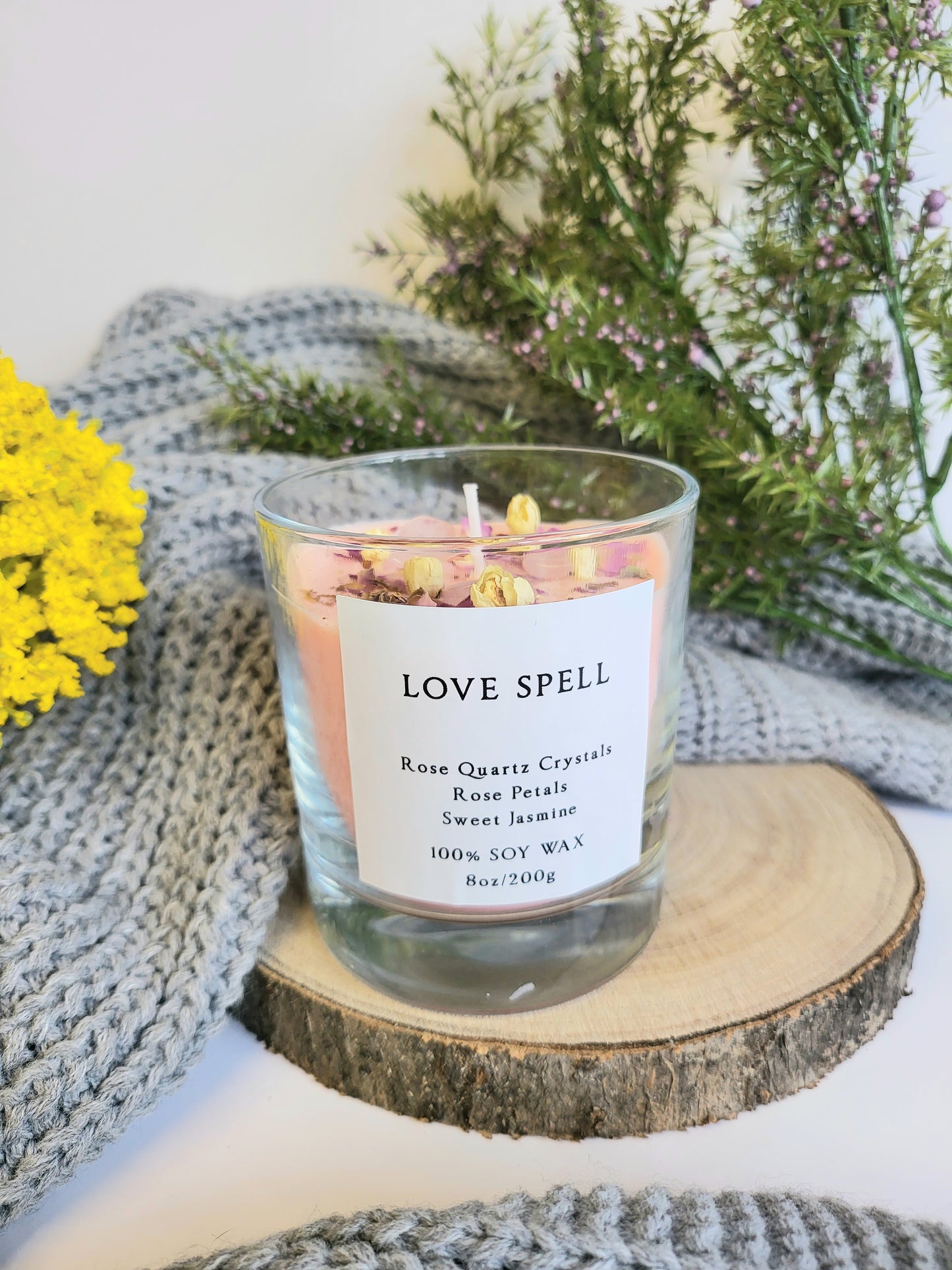 Rose quartz love spell candle.